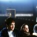 Cena do filme Donnie Darko com o protagonista, sua namorada o coelho gigante que o acompanha